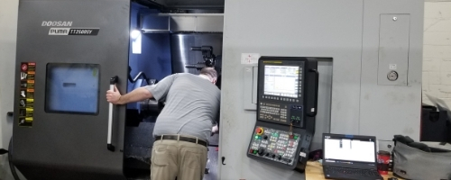 Technical Specialist inspecting machine 